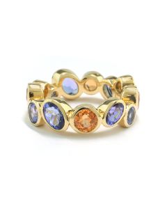Goldener Ring Edelsteine hochkarätig Tansanit Granat 18 Karat Gelbgold handgearbeitet