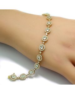 blaue Paraiba-Turmaline Armkette Gold an Handgelenk